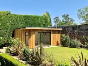 The angled wall softens the building in the garden