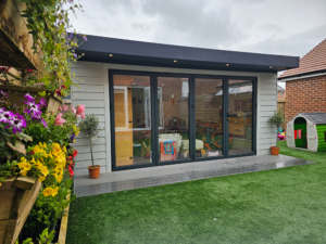 The bi-fold doors can be pushed to one side for indoor-outdoor play